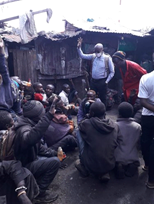 Community outreach visit in an informal settlement